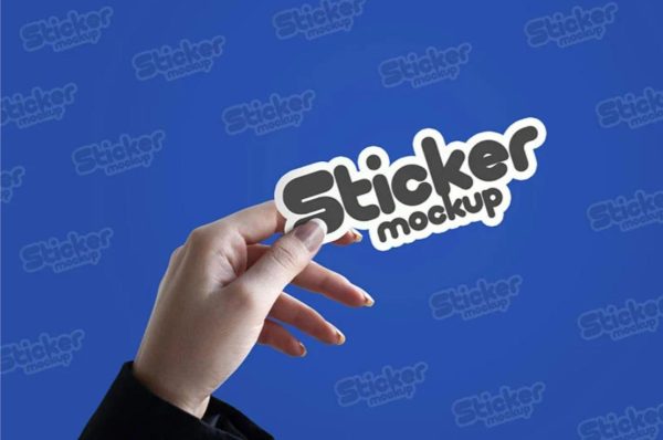 Free Sticker in Hand Mockup
