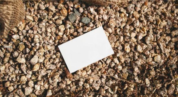 Card Lying on Stone Background