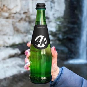High Resolution Bottle in Hand Mockup