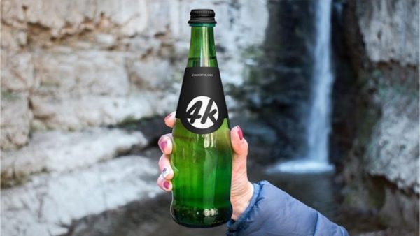 High Resolution Bottle in Hand Mockup