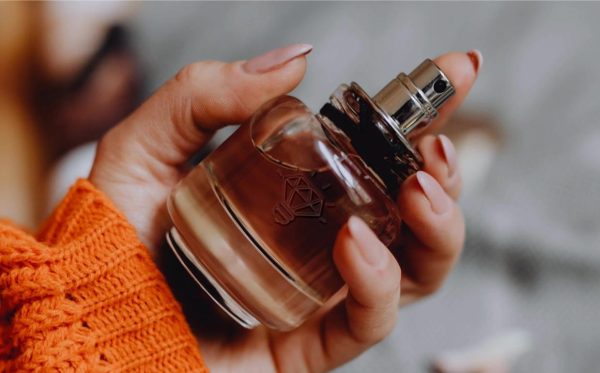 Perfume in Hand Mockup Template